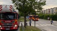 Två brandbilar längs Rinkebystråket.
